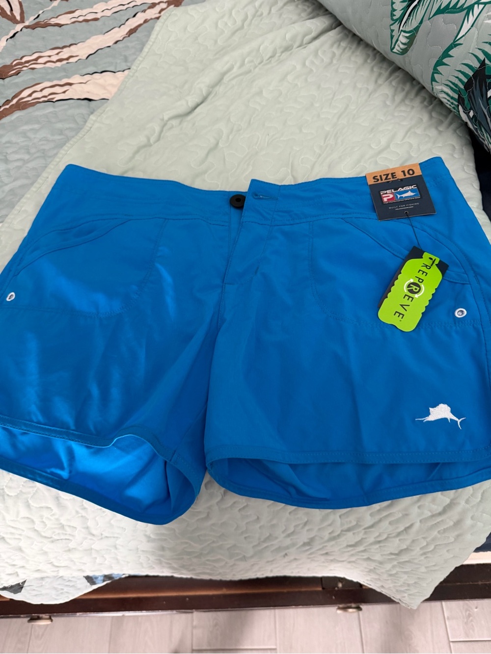 Pelagic Electric Blue Women's Board Shorts with Marlin Tag
